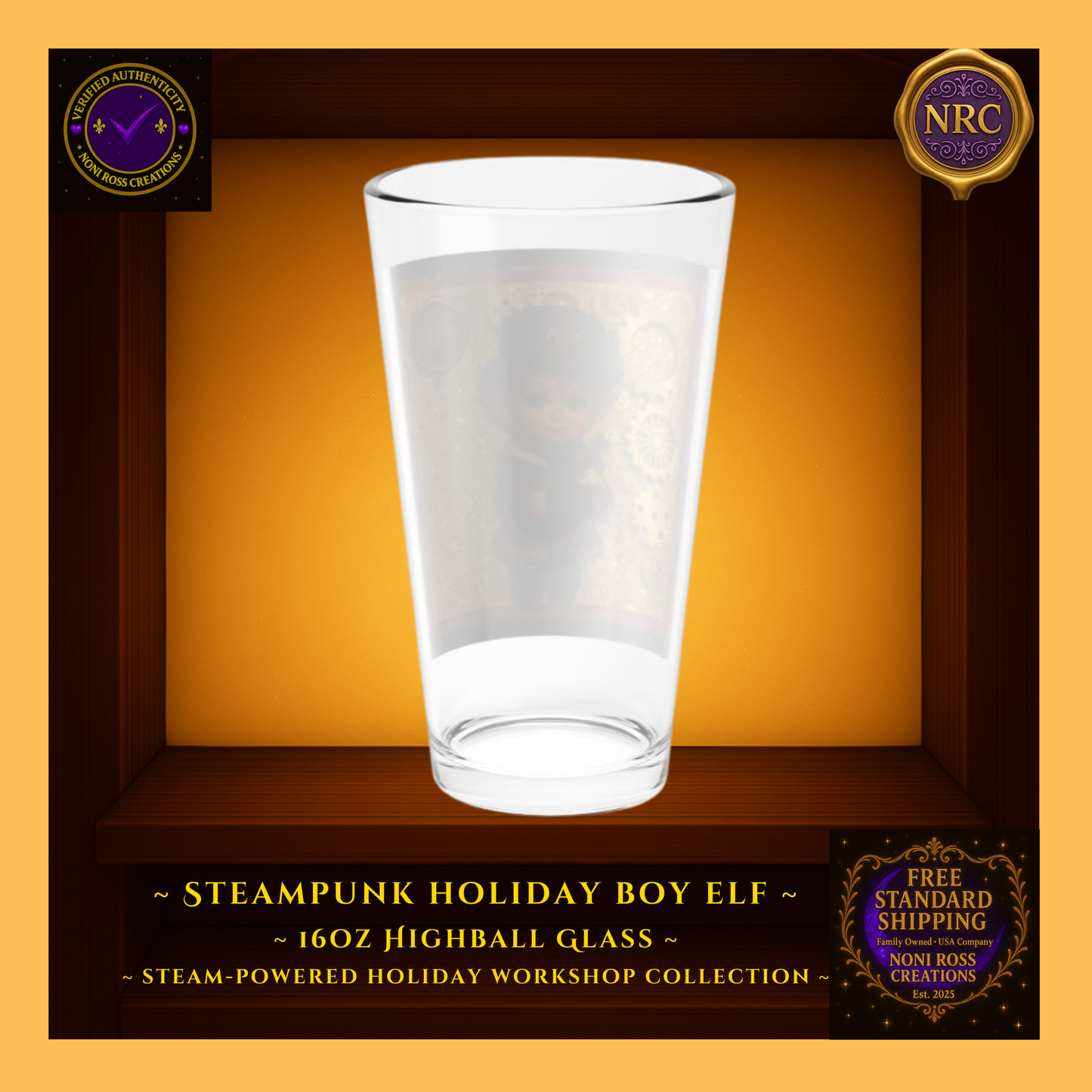 Back view of Steam-Powered Boy Elf 16oz highball glass in NRC cubby, showing plain glass back and Noni Ross Creations branding area.