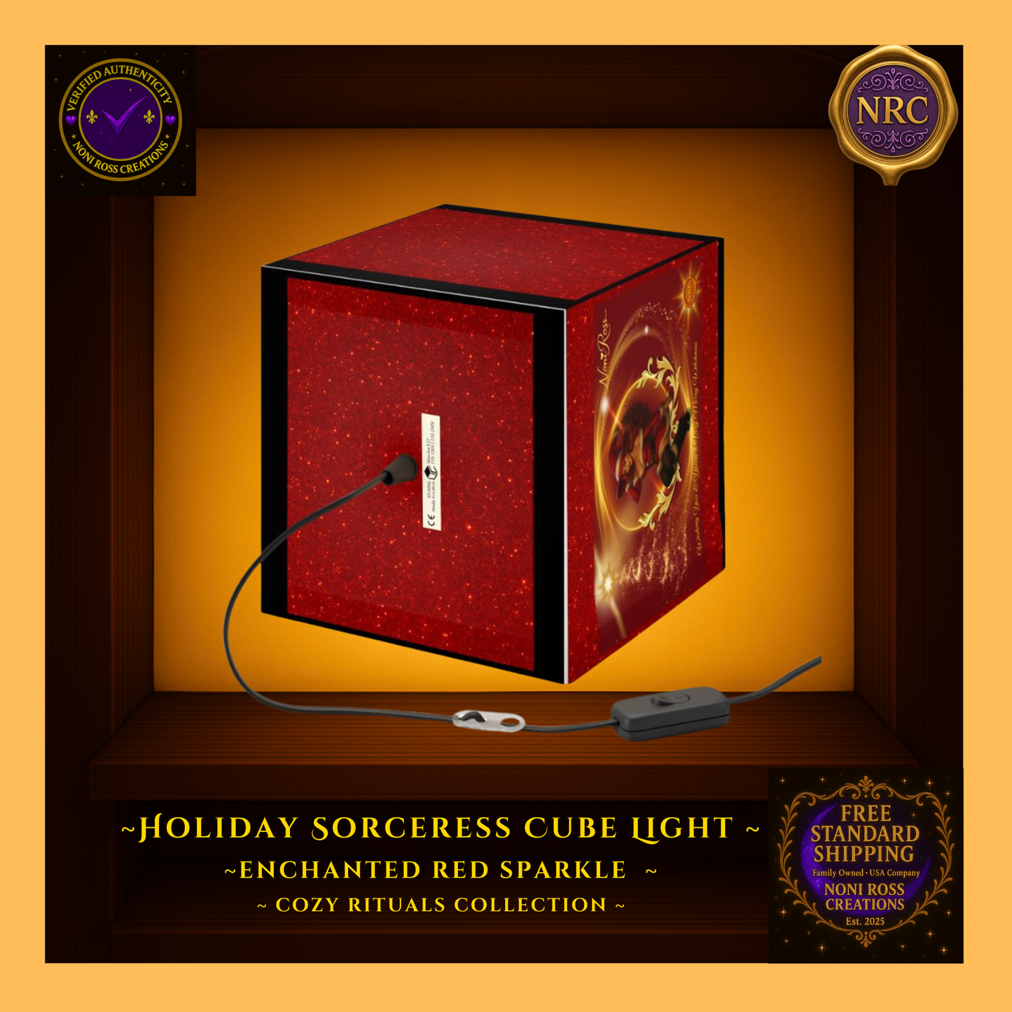 Front view of the Holiday Sorceress Cube Light in a gold cubby frame displaying the full sorceress artwork with Christmas sparkles and glowing accents