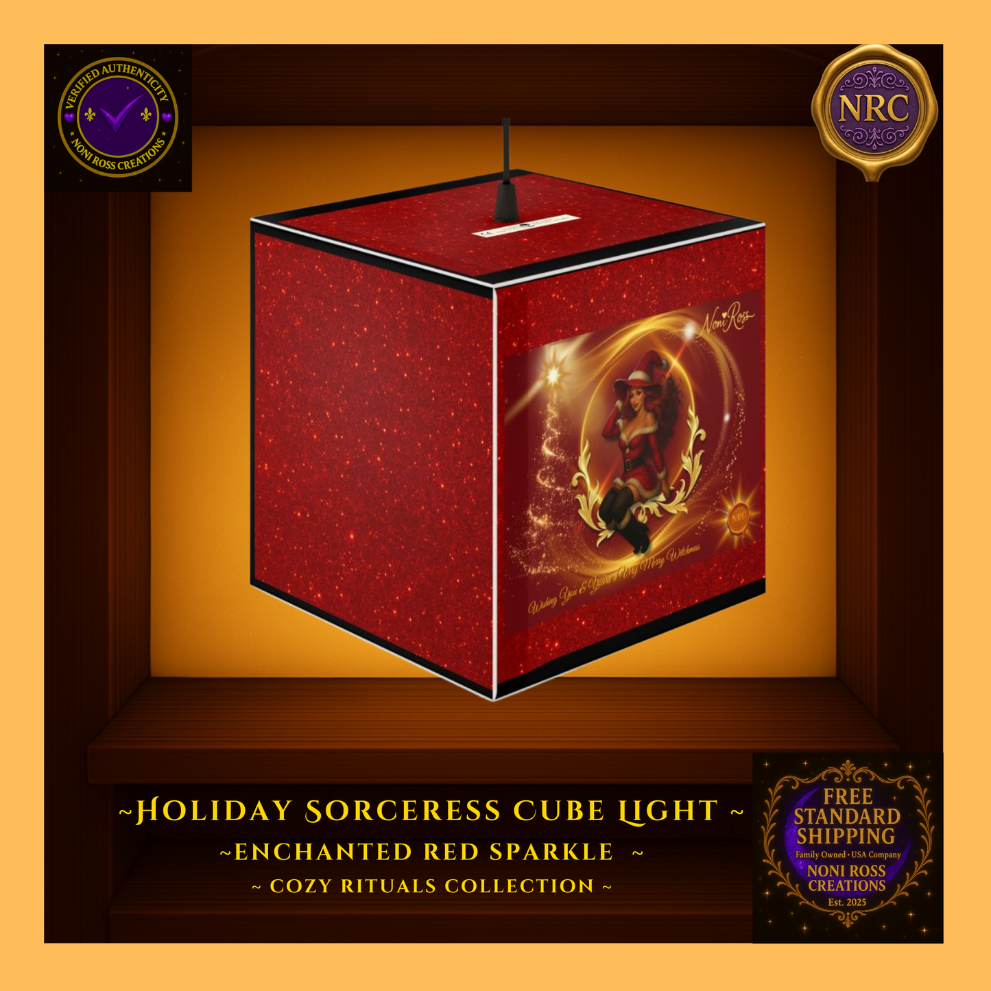 Holiday Sorceress Cube Light displayed in a gold cubby frame, featuring red sparkle background, golden magical swirls, and festive Noni Ross Creations holiday artwork