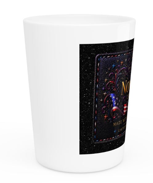Side view of white ceramic shot glass highlighting logo placement and smooth finish
