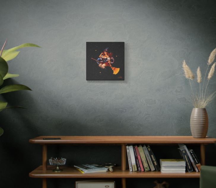 Americana witch wall art canvas in stylish interior setting featuring magical pinup witch with broom and starry night sky