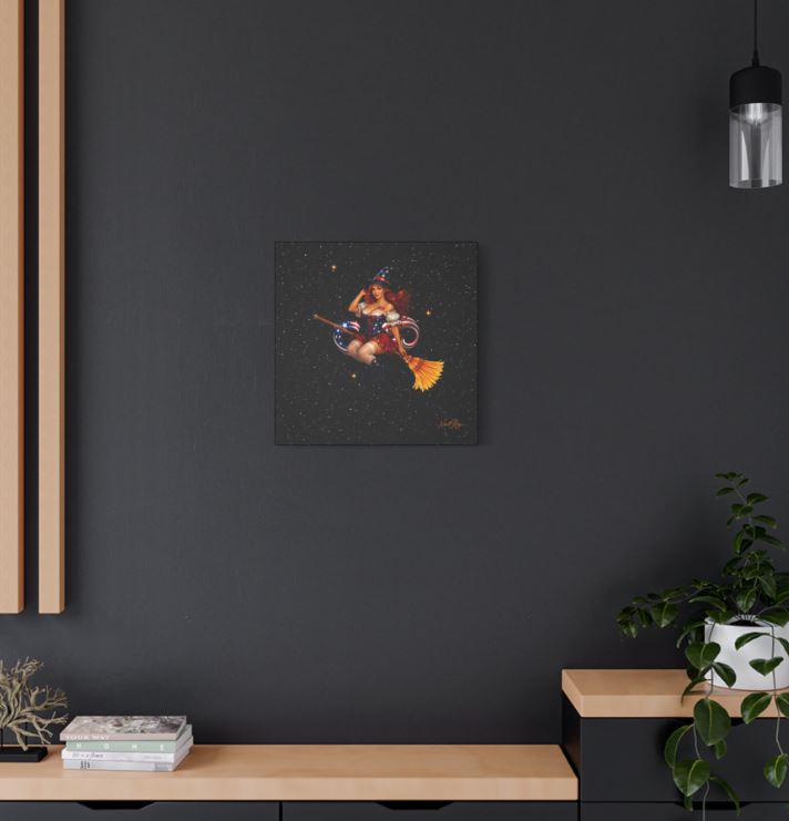 Americana witch wall art canvas styled in living room with bold red white blue pinup witch and celestial stars