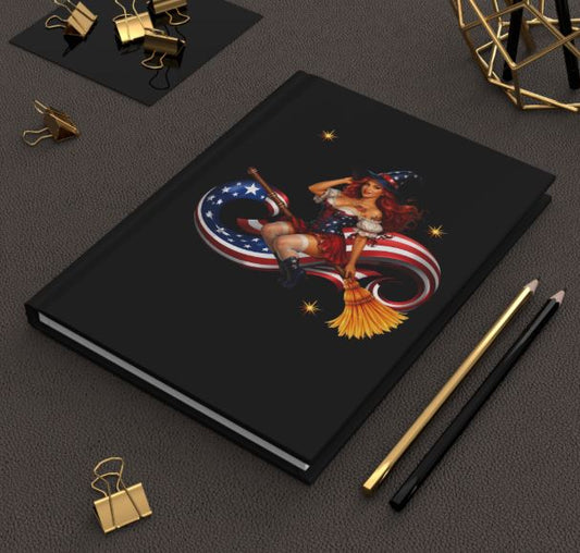 Hardcover journal displayed on desk with patriotic witch artwork and premium matte finish